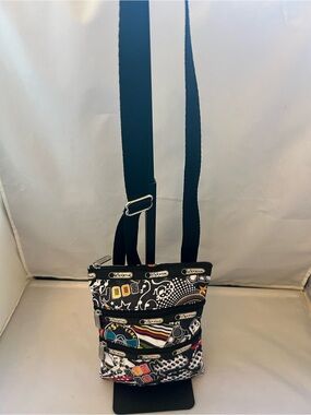 Lesportsac Black Pouch with Colorful Graphic Accents and Silver Zip Pull